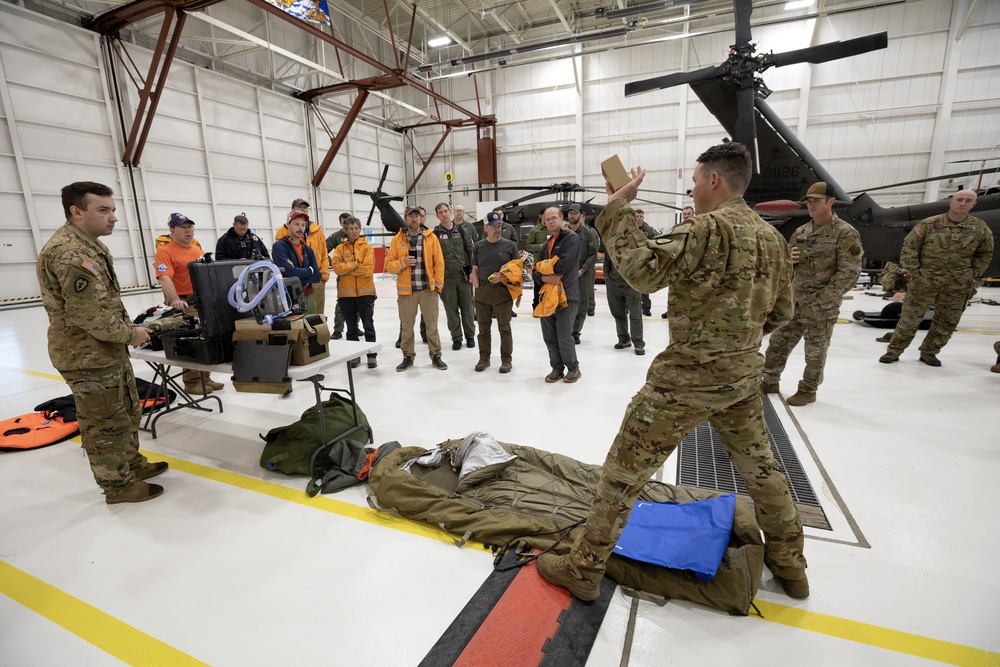 Alaska Army National Guard Black Hawk aviators host mission partners for multi-agency hoist symposium