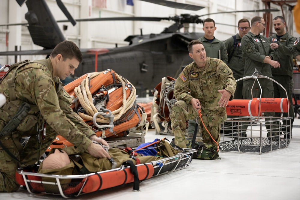 Alaska Army National Guard Black Hawk aviators host mission partners for multi-agency hoist symposium