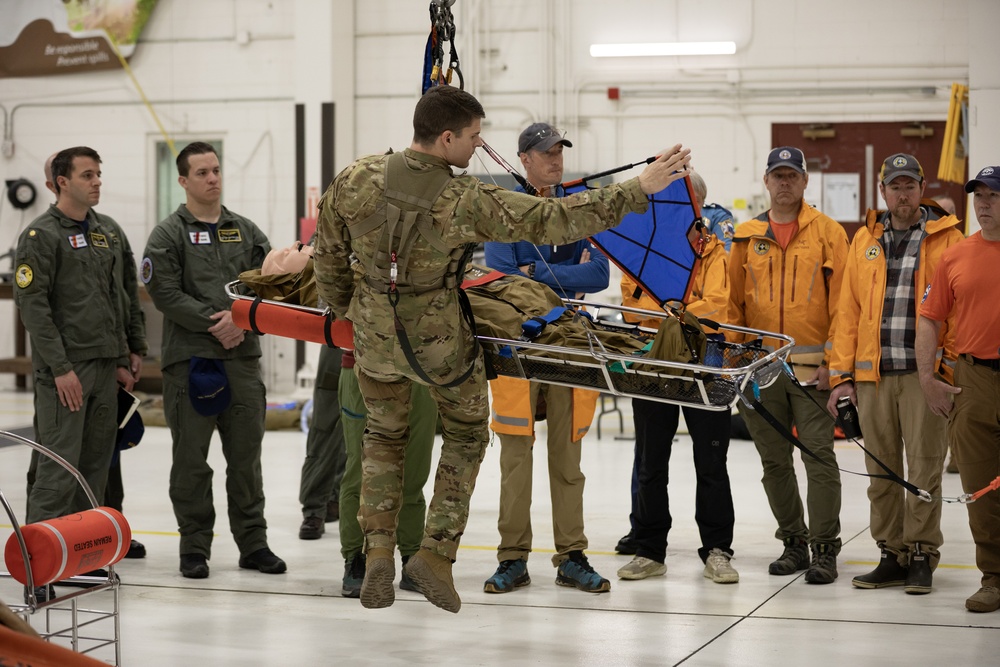 Alaska Army National Guard Black Hawk aviators host mission partners for multi-agency hoist symposium