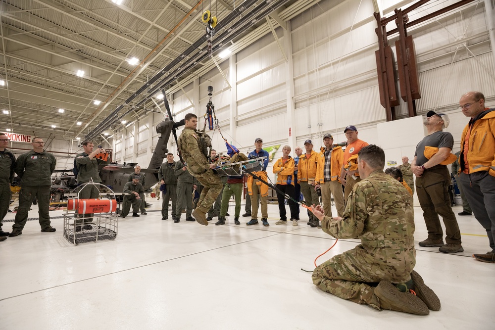 Alaska Army National Guard Black Hawk aviators host mission partners for multi-agency hoist symposium