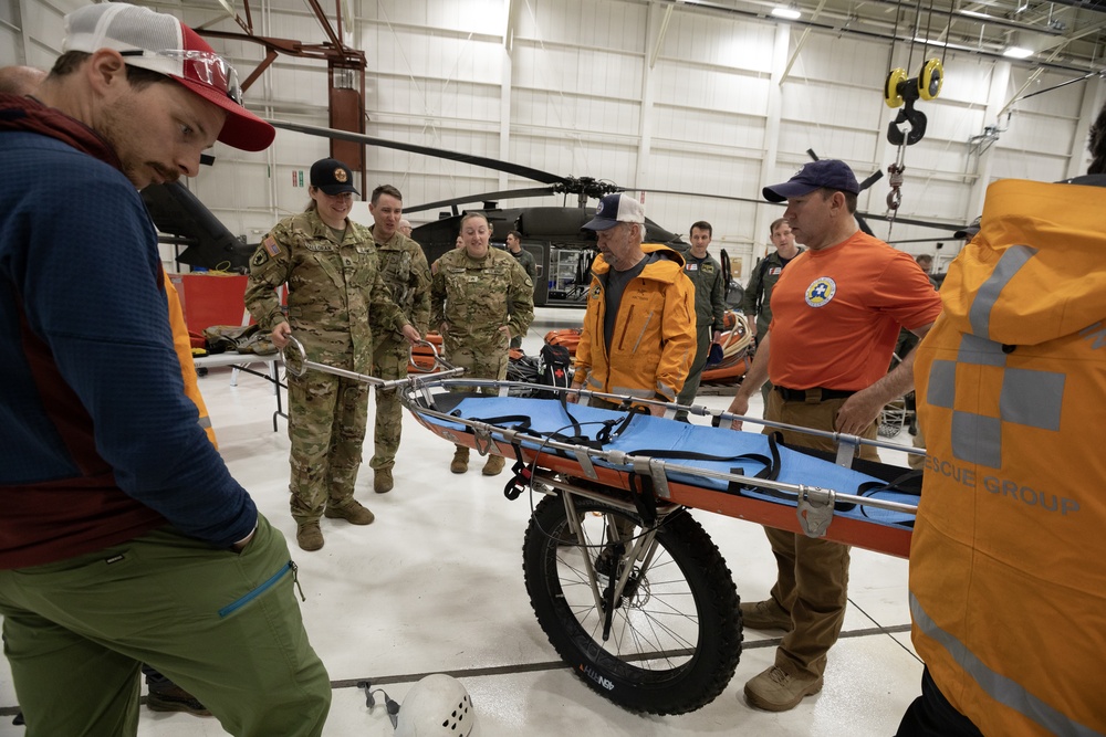 Alaska Army National Guard Black Hawk aviators host mission partners for multi-agency hoist symposium