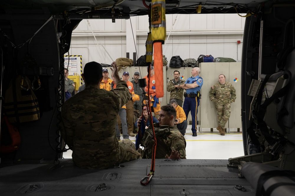 Alaska Army National Guard Black Hawk aviators host mission partners for multi-agency hoist symposium