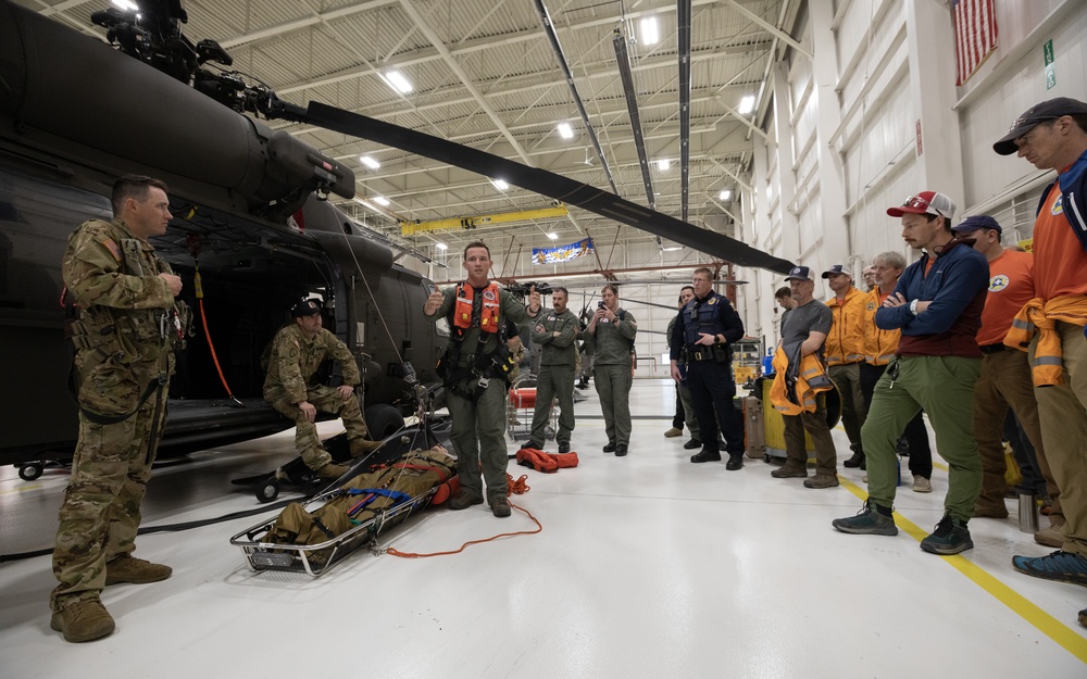 Alaska Army National Guard Black Hawk aviators host mission partners for multi-agency hoist symposium