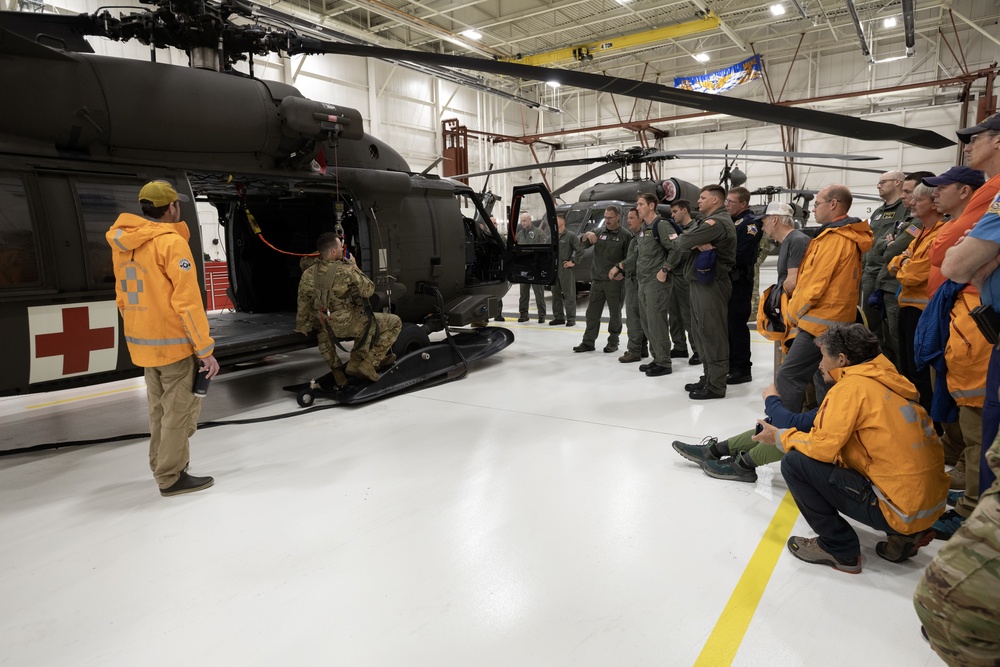 Alaska Army National Guard Black Hawk aviators host mission partners for multi-agency hoist symposium
