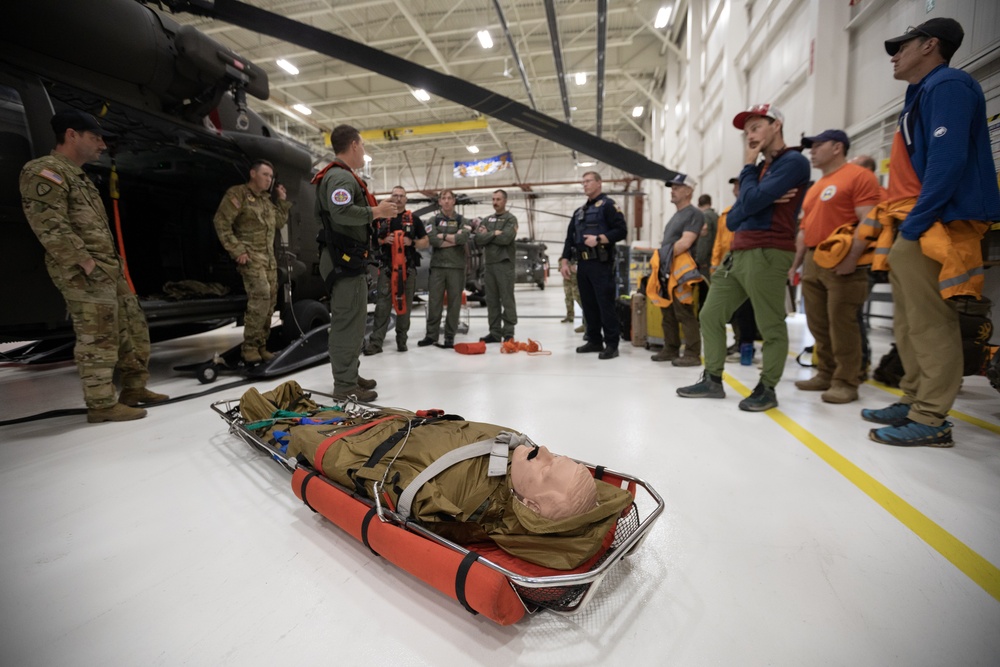 Alaska Army National Guard Black Hawk aviators host mission partners for multi-agency hoist symposium