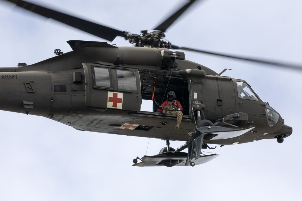 Alaska Army National Guard Black Hawk aviators host mission partners for multi-agency hoist symposium
