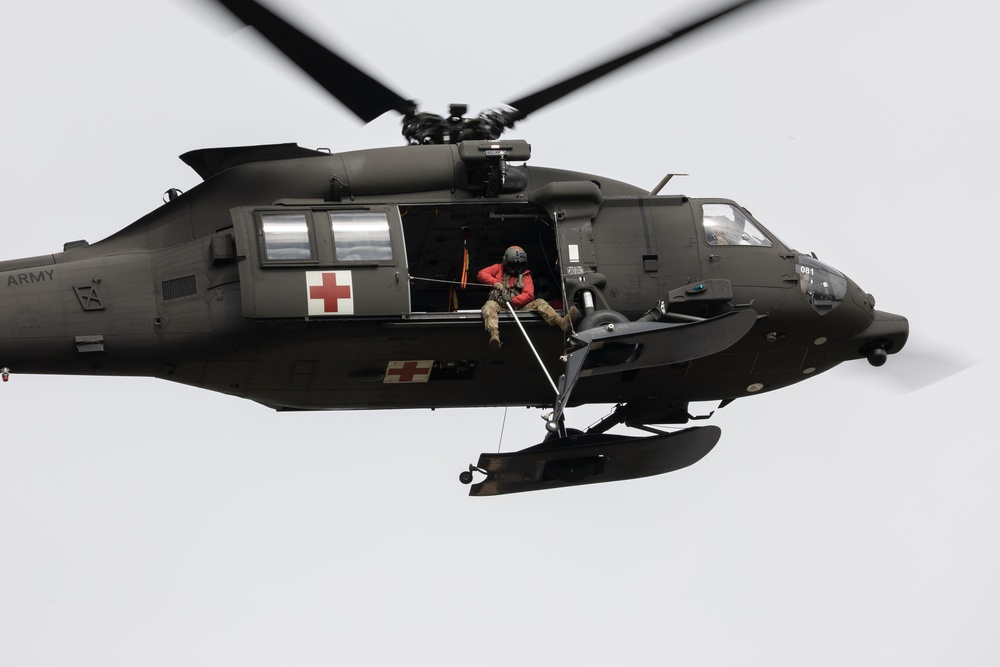 Alaska Army National Guard Black Hawk aviators host mission partners for multi-agency hoist symposium