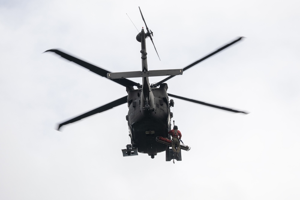 Alaska Army National Guard Black Hawk aviators host mission partners for multi-agency hoist symposium