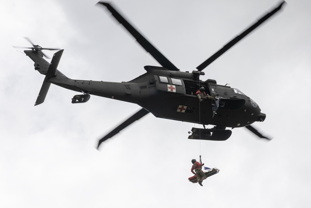 Alaska Army National Guard Black Hawk aviators host mission partners for multi-agency hoist symposium
