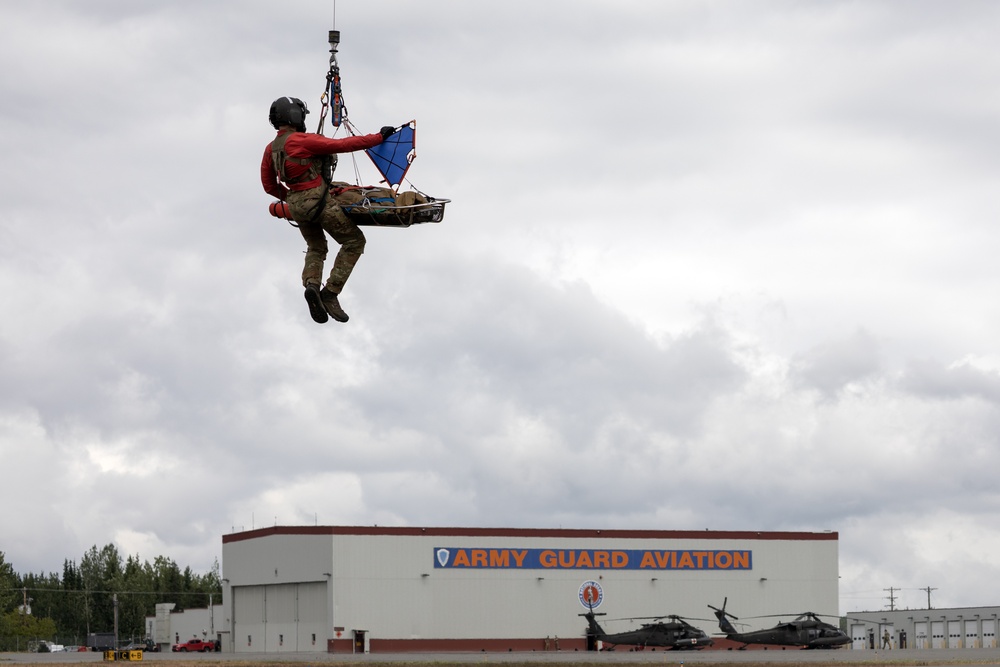 Alaska Army National Guard Black Hawk aviators host mission partners for multi-agency hoist symposium