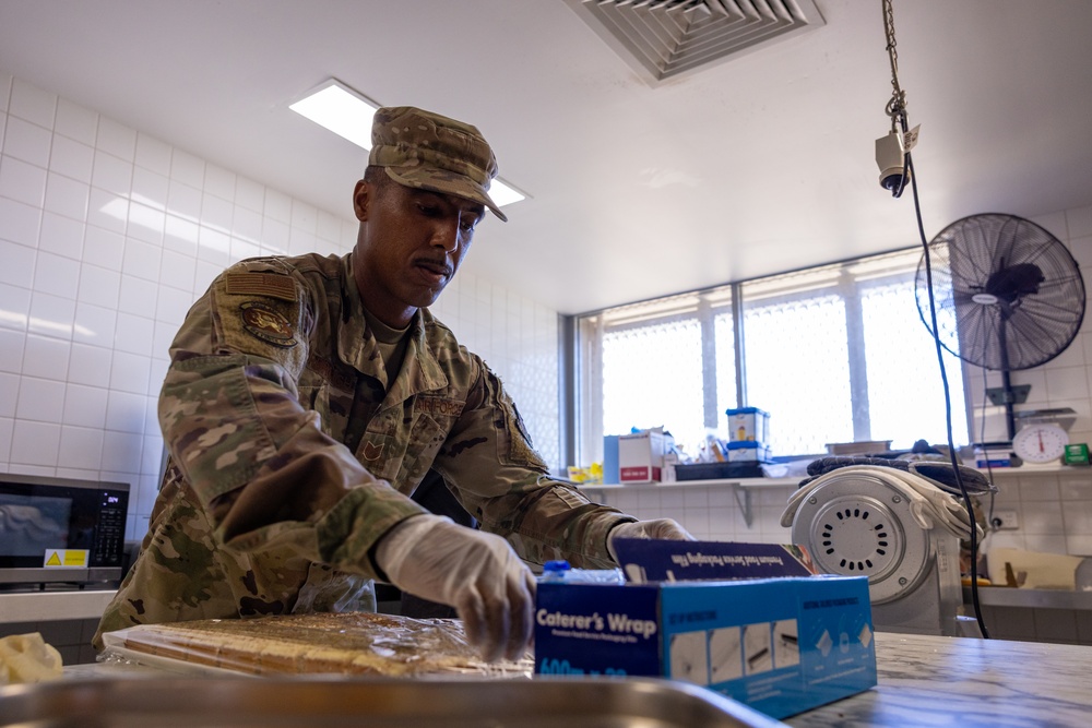 U.S. Airmen Serve Meals at RAAF Dining Facility