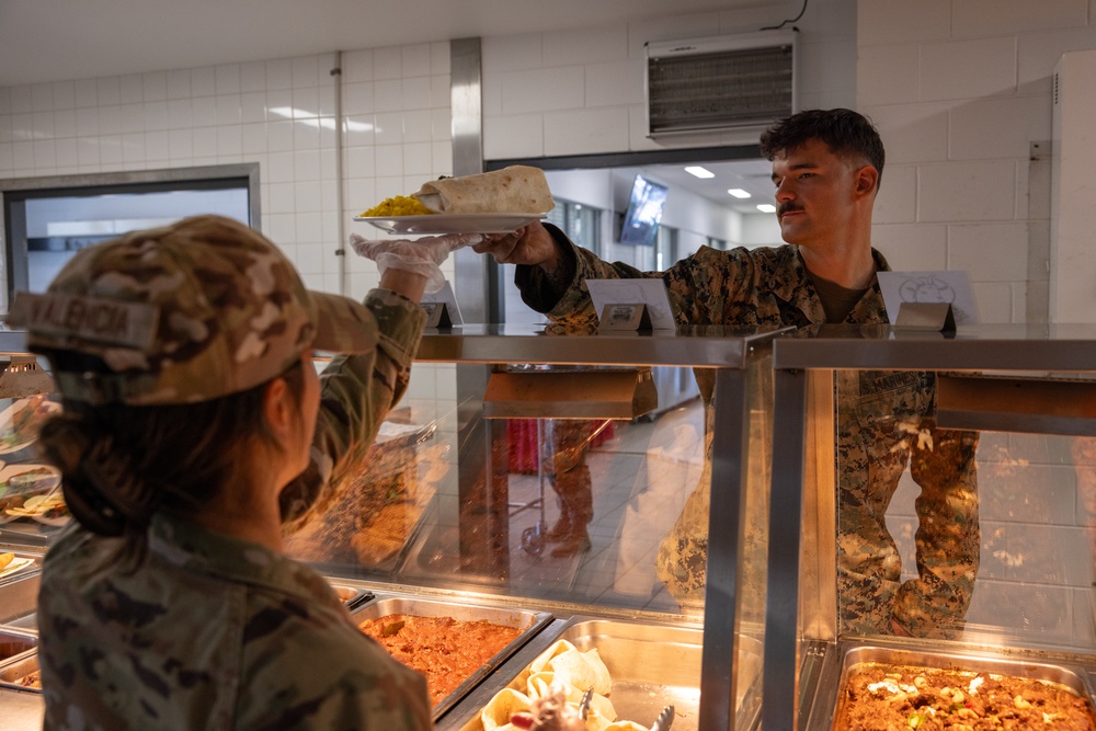 U.S. Airmen Serve Meals at RAAF Dining Facility