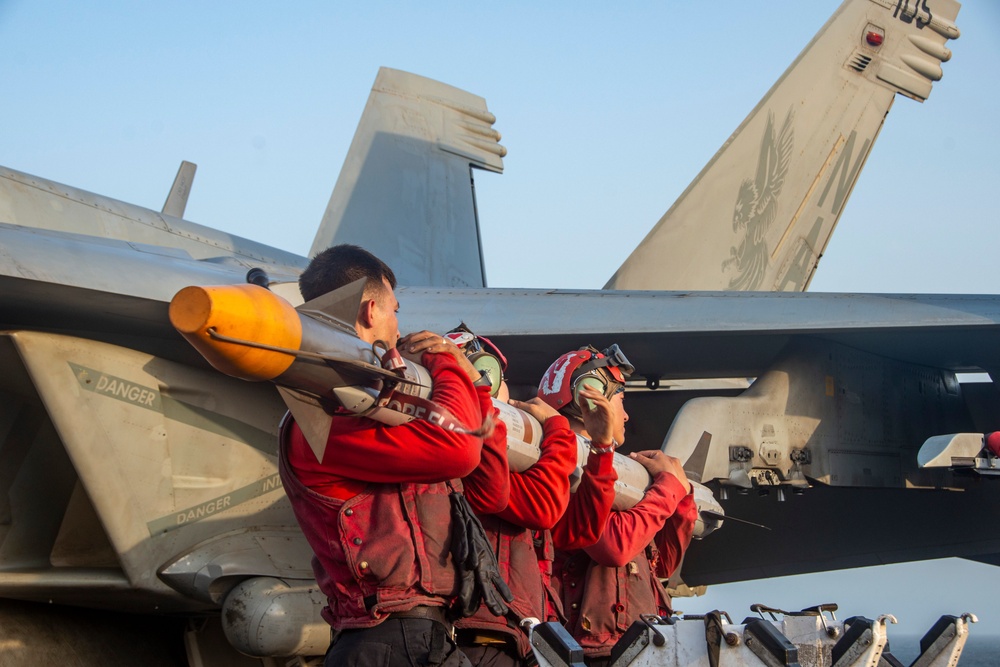 Nimitz Sailors Move Ordnance