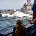 Nimitz Sailors Heave Around Line During Refueling-at-Sea