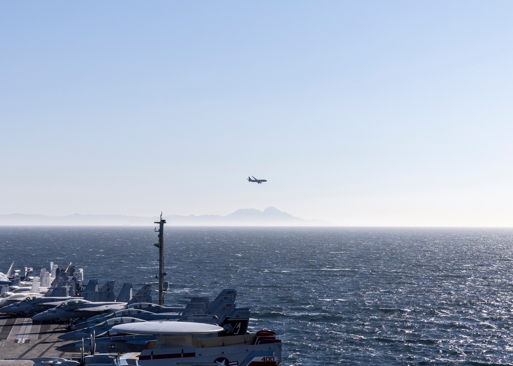 P-8 Poseidon Flies by USS Gerald R. Ford (CVN 78)