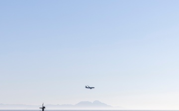 P-8 Poseidon Flies by USS Gerald R. Ford (CVN 78)