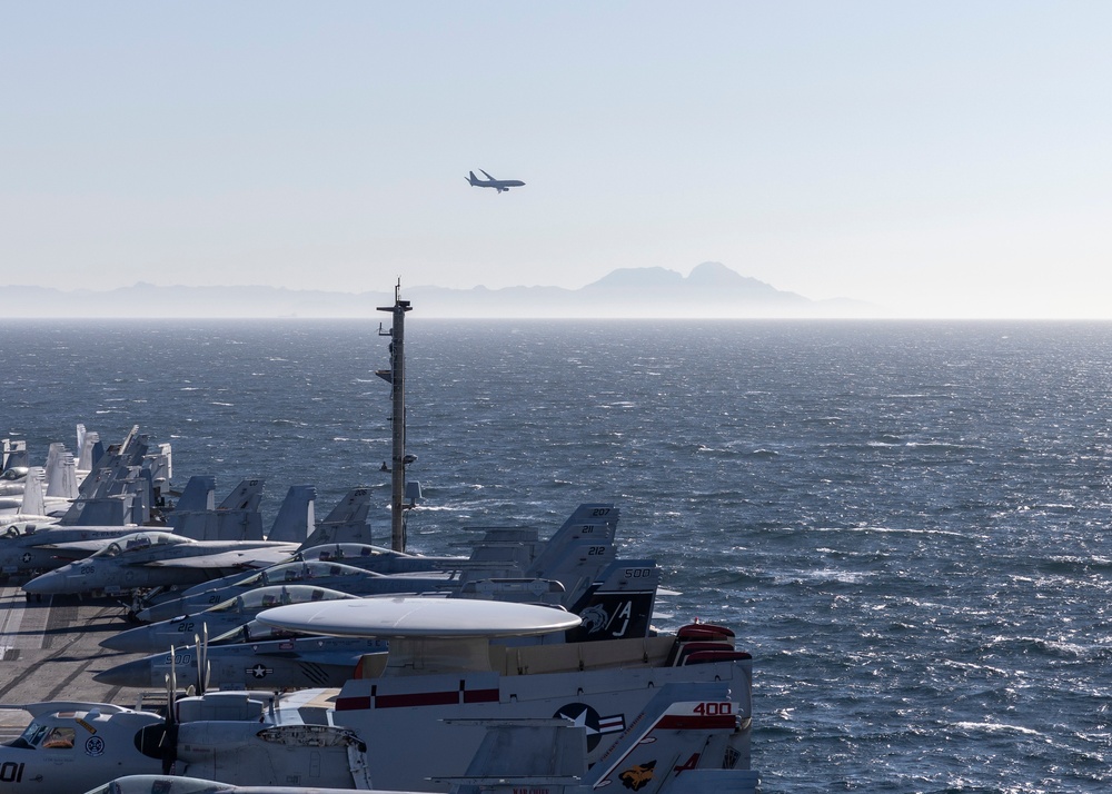 P-8 Poseidon Flies by USS Gerald R. Ford (CVN 78)