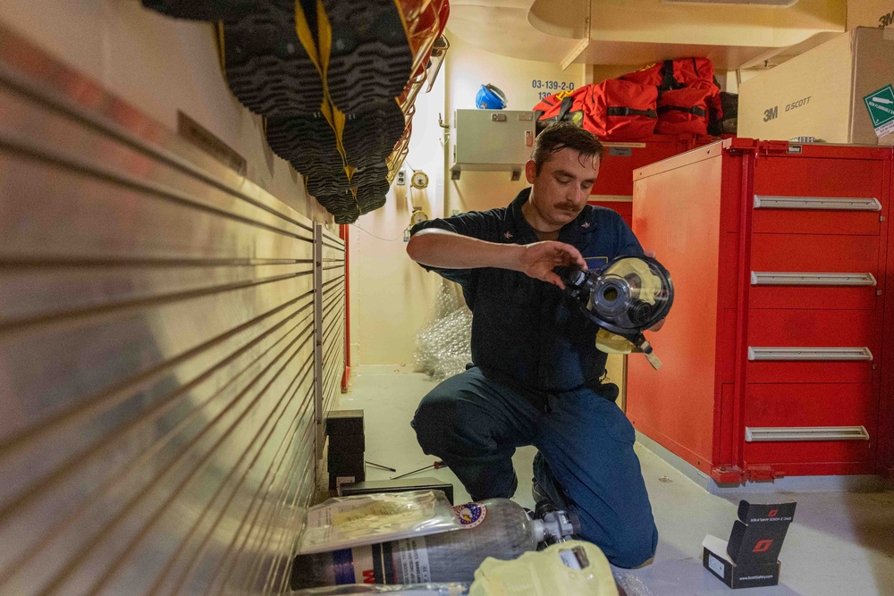 Sailor Conducts Maintenance Sailor Conducts Maintenance