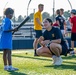 Sailors play baseball with local children during Navy Week Milwaukee 2025