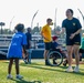 Sailors play baseball with local children during Navy Week Milwaukee 2025