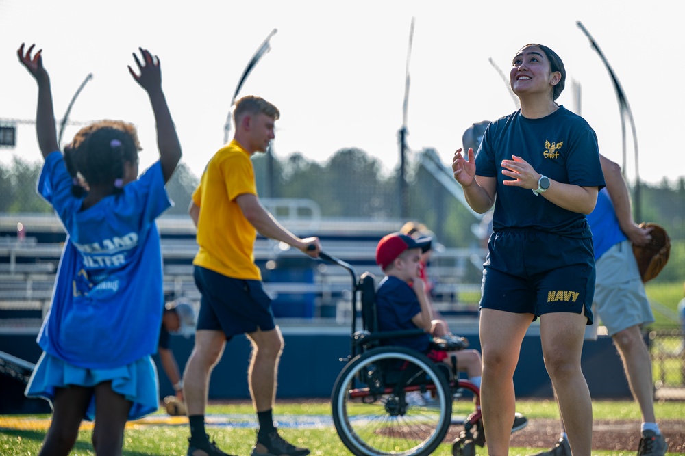 Sailors play baseball with local children during Navy Week Milwaukee 2025