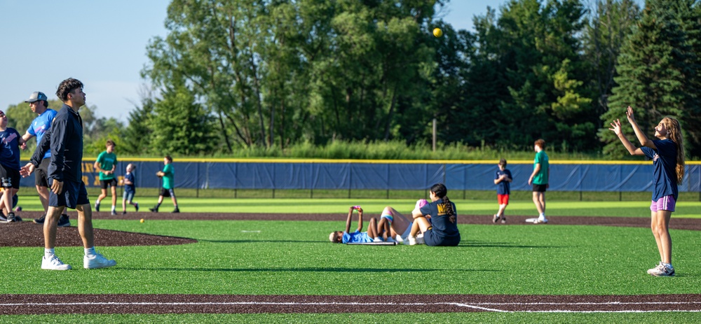 Sailors play baseball with local children during Navy Week Milwaukee 2025