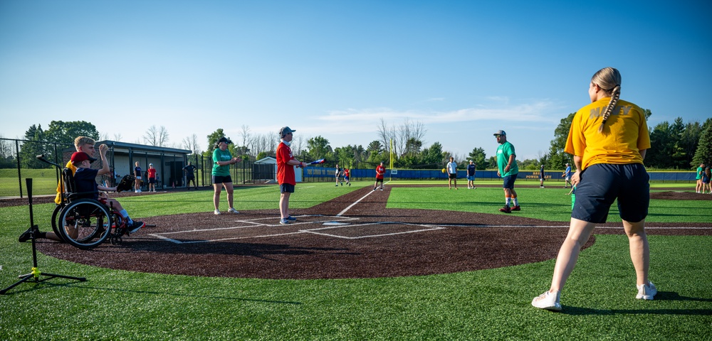 Sailors play baseball with local children during Navy Week Milwaukee 2025