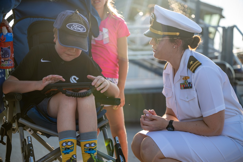 Sailors play baseball with local children during Navy Week Milwaukee 2025