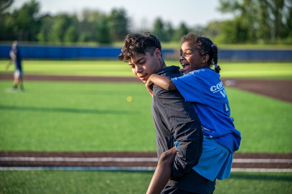 Sailors play baseball with local children during Navy Week Milwaukee 2025