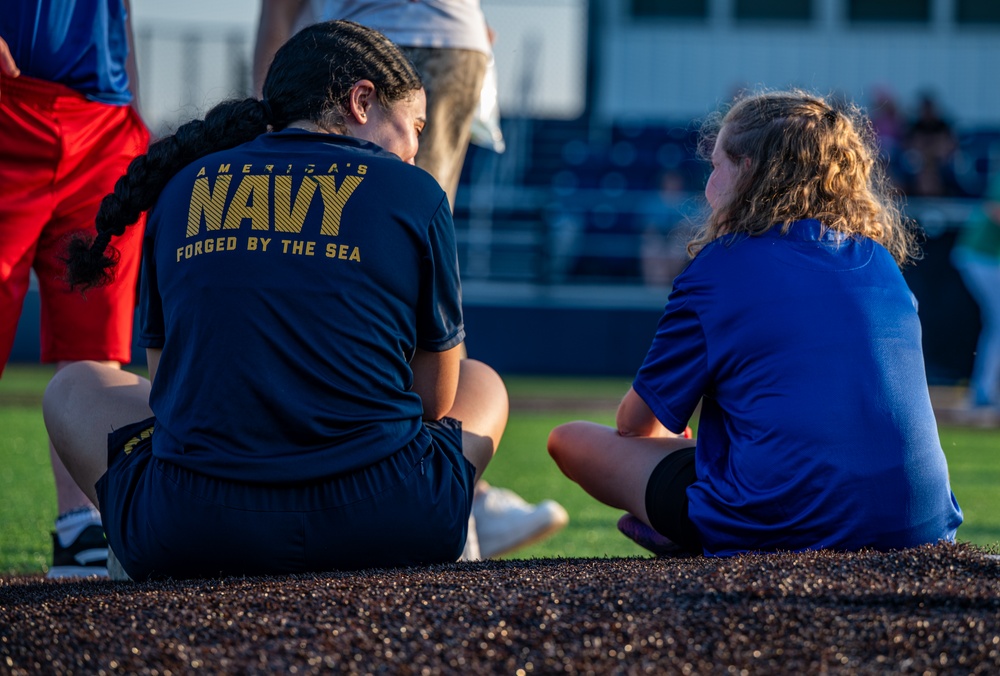 Sailors play baseball with local children during Navy Week Milwaukee 2025