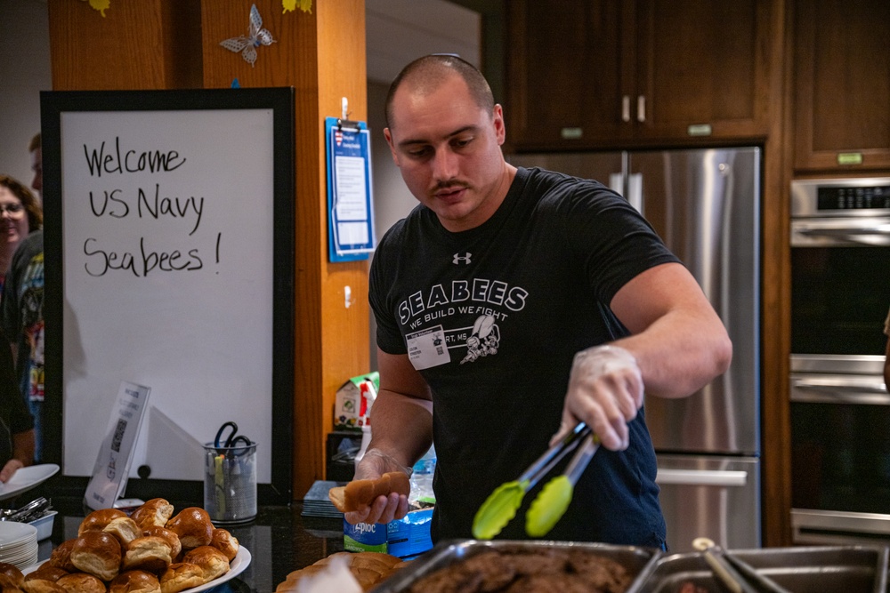 Sailors serve food at Ronald McDonald House Charities of Eastern Wisconsin during Navy Week Milwaukee 2025