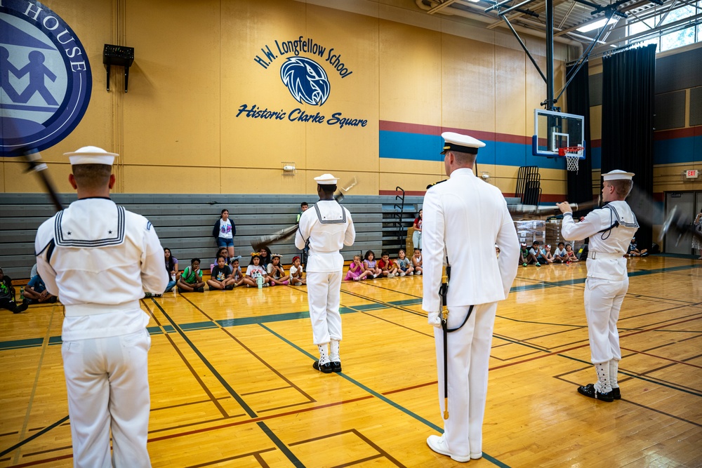 Navy Ceremonial Honor Guard performs at Journey House, Inc. during Navy Week Milwaukee 2025