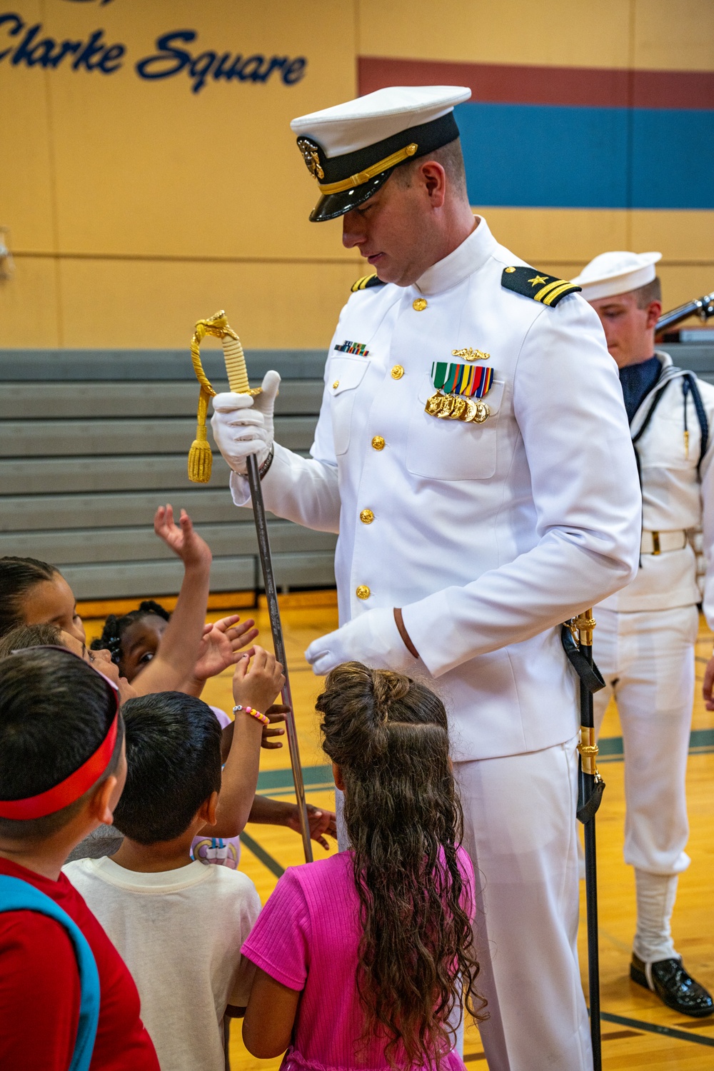 Navy Ceremonial Honor Guard performs at Journey House, Inc. during Navy Week Milwaukee 2025