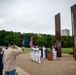Sailors participate in a ceremony at the Milwaukee Vietnam Veterans Memorial during Navy Week Milwaukee 2025