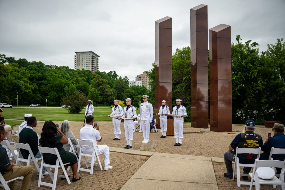 Sailors participate in a ceremony at the Milwaukee Vietnam Veterans Memorial during Navy Week Milwaukee 2025