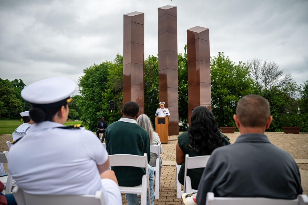 Sailors participate in a ceremony at the Milwaukee Vietnam Veterans Memorial during Navy Week Milwaukee 2025