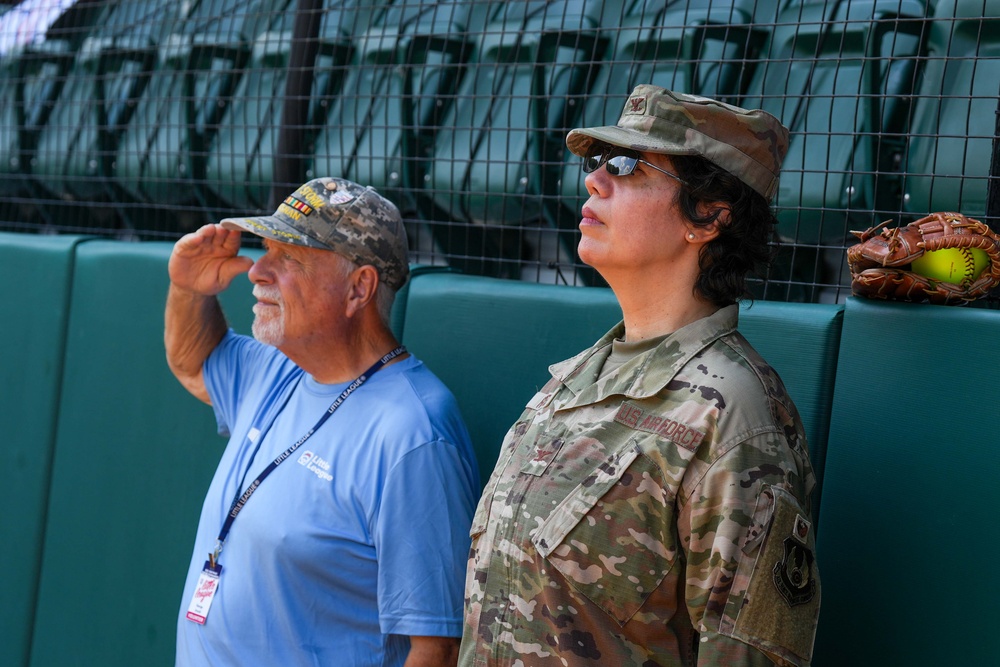 Col. Kerya Reyes throws first pitch in Little League Softball Southeast Tournament