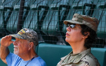 Col. Kerya Reyes throws first pitch in Little League Softball Southeast Tournament