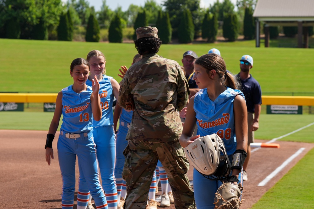 Col. Kerya Reyes throws first pitch in Little League Softball Southeast Tournament