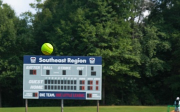 Col. Kerya Reyes throws first pitch in Little League Softball Southeast Tournament