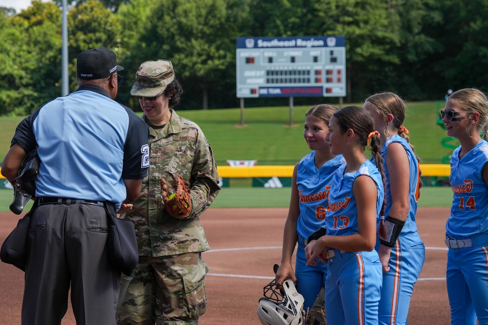Col. Kerya Reyes throws first pitch in Little League Softball Southeast Tournament