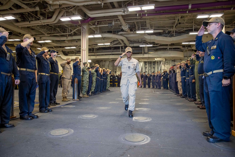 USS Tripoli Command Master Chief Piped Ashore