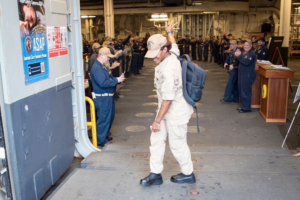 USS Tripoli Command Master Chief Piped Ashore