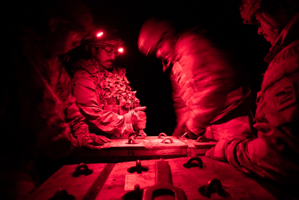 2-146 Field Artillery Regiment fires M777 howitzers at night