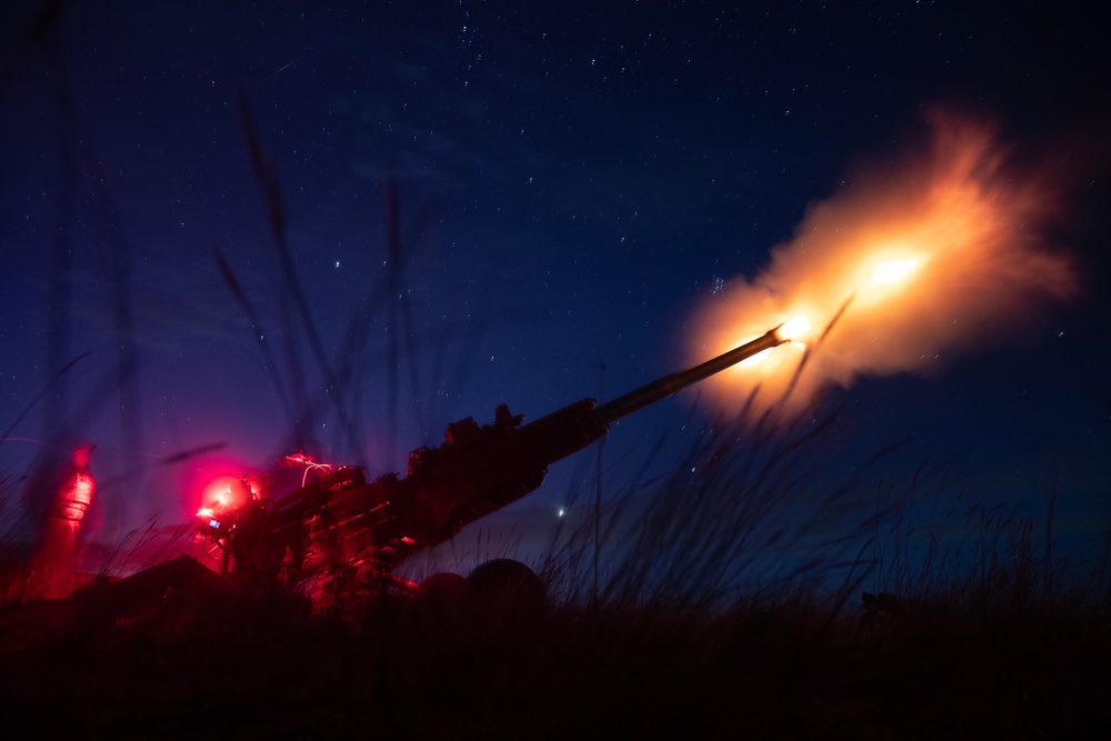2-146 Field Artillery Regiment fires M777 howitzers at night