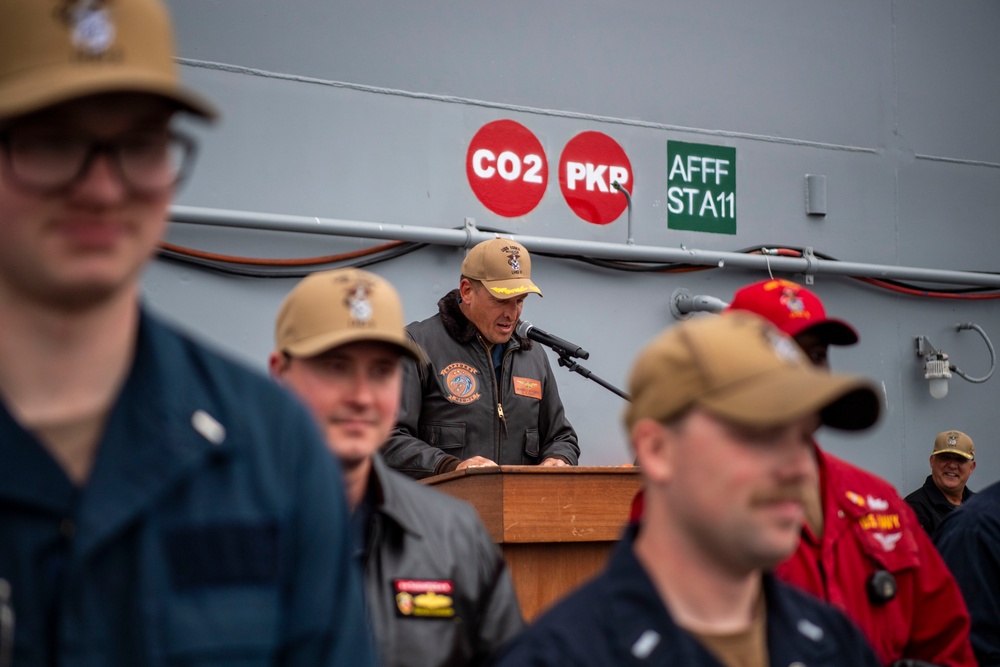 USS ESSEX (LHD 2) Surface Warfare Officer leather jacket presentation ceremony.