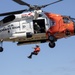 Alaska based Coast Guard aviators showcase rescue demonstration during multi-agency hoist symposium