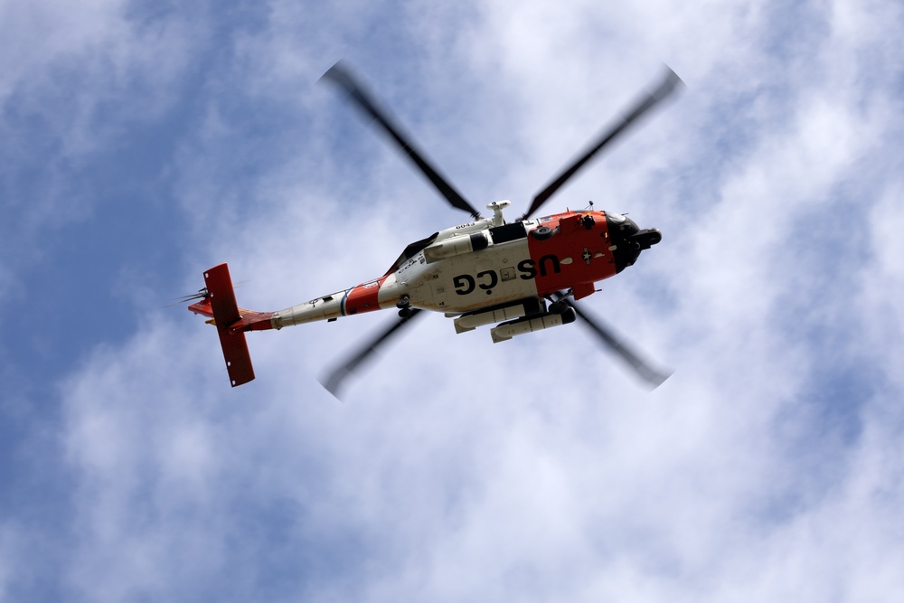 Alaska based Coast Guard aviators showcase rescue demonstration during multi-agency hoist symposium