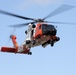 Alaska based Coast Guard aviators showcase rescue demonstration during multi-agency hoist symposium