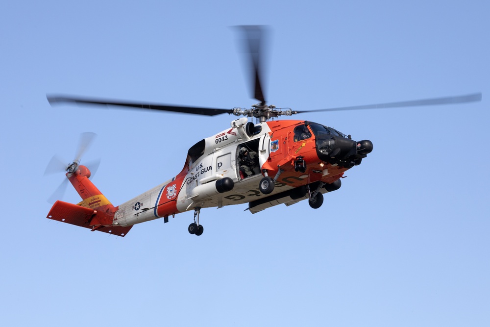 Alaska based Coast Guard aviators showcase rescue demonstration during multi-agency hoist symposium